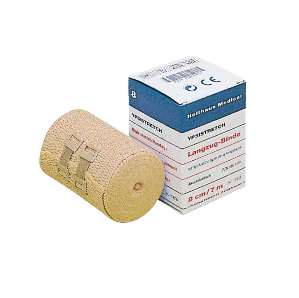 Holthaus Medical YPSISTRETCH Langzugbinde: beige Rollenverband neben Verpackungskarton mit Aufdruck