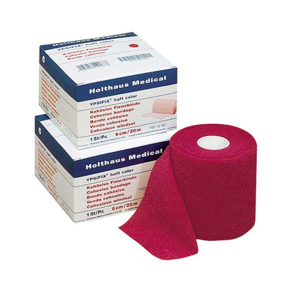 Pinkfarbene YPSIFIX® Fixierbinde haftend, Bandrolle mit beschrifteten Kartons