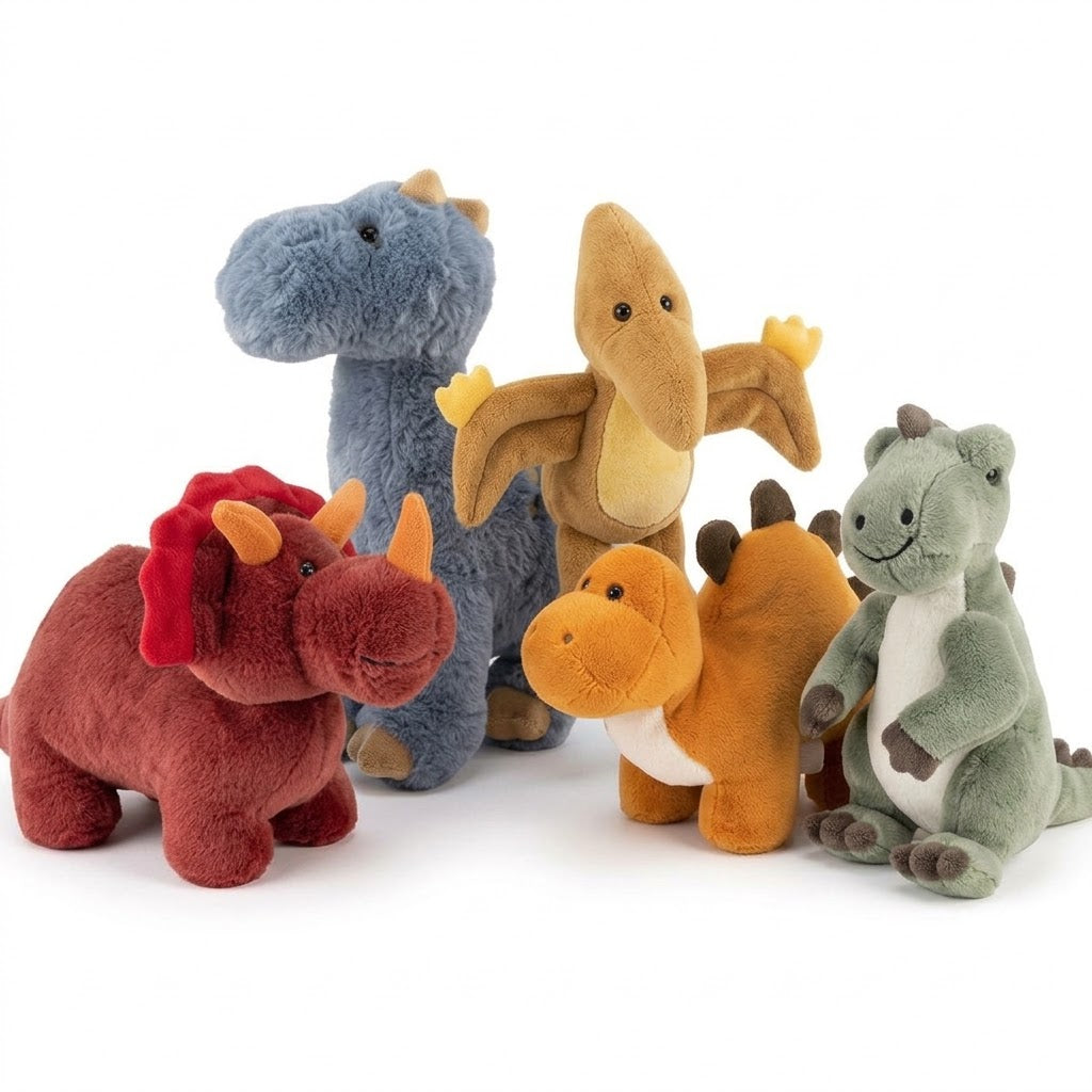 Körnerkissen Dinosaurier-Motiv, mehrere Plüsch-Dinos in Blau, Braun, Rot und Grün